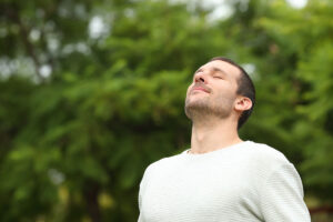 man enjoying the outside in outpatient treatment center in massachusetts