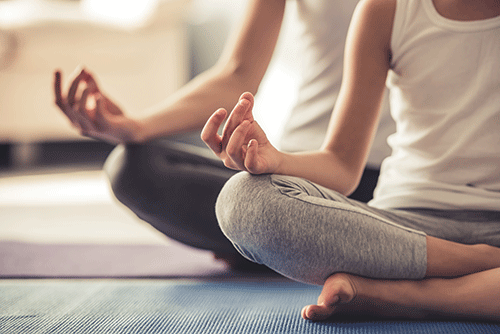individuals in a holistic addiction treatment program participate in meditation therapy for addiction